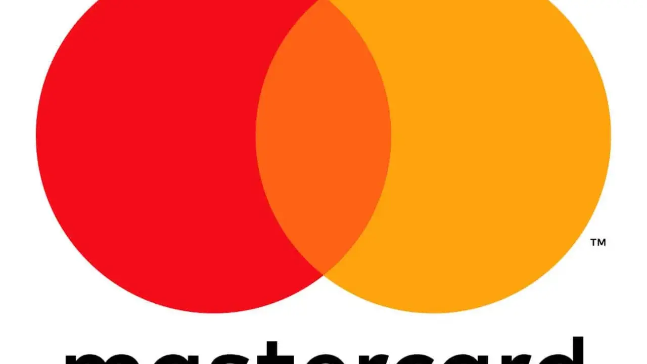 Logo de Mastercard España con sus dos círculos superpuestos, rojo y naranja, y el nombre de la marca.